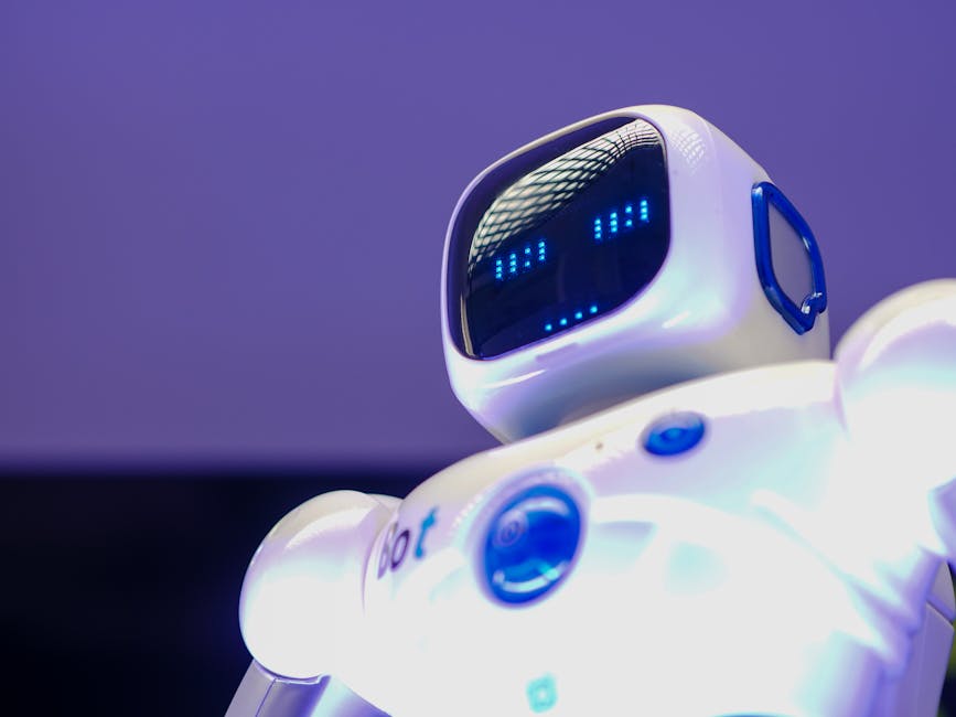 A modern humanoid robot with digital face and luminescent screen